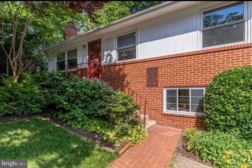5885 9th Road North Arlington, VA 22205 - Photo 46 of 48 Charming brick home with lush greenery.
