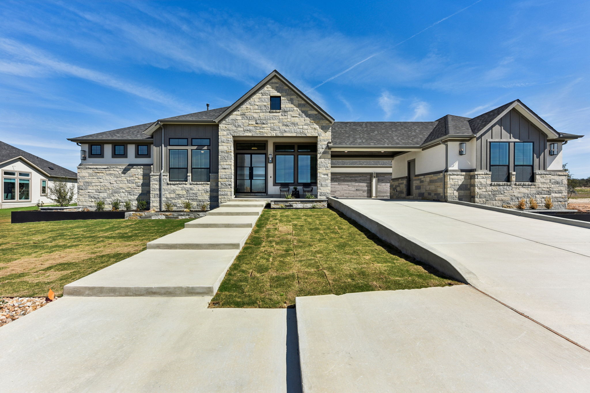 a front view of a house with yard