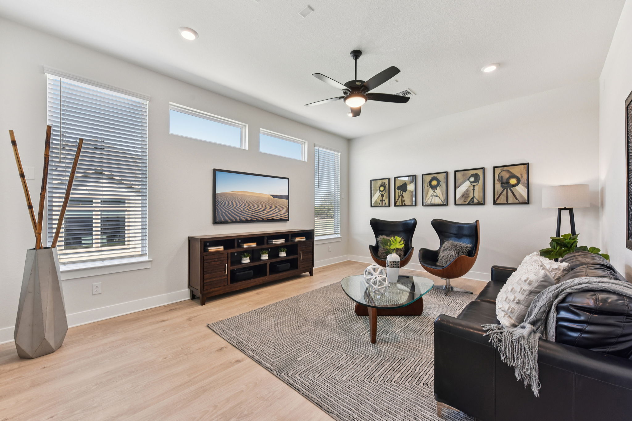 1400 Paxton Lane Georgetown, TX 78633 - Photo 16 of 39 a living room with furniture and a flat screen tv