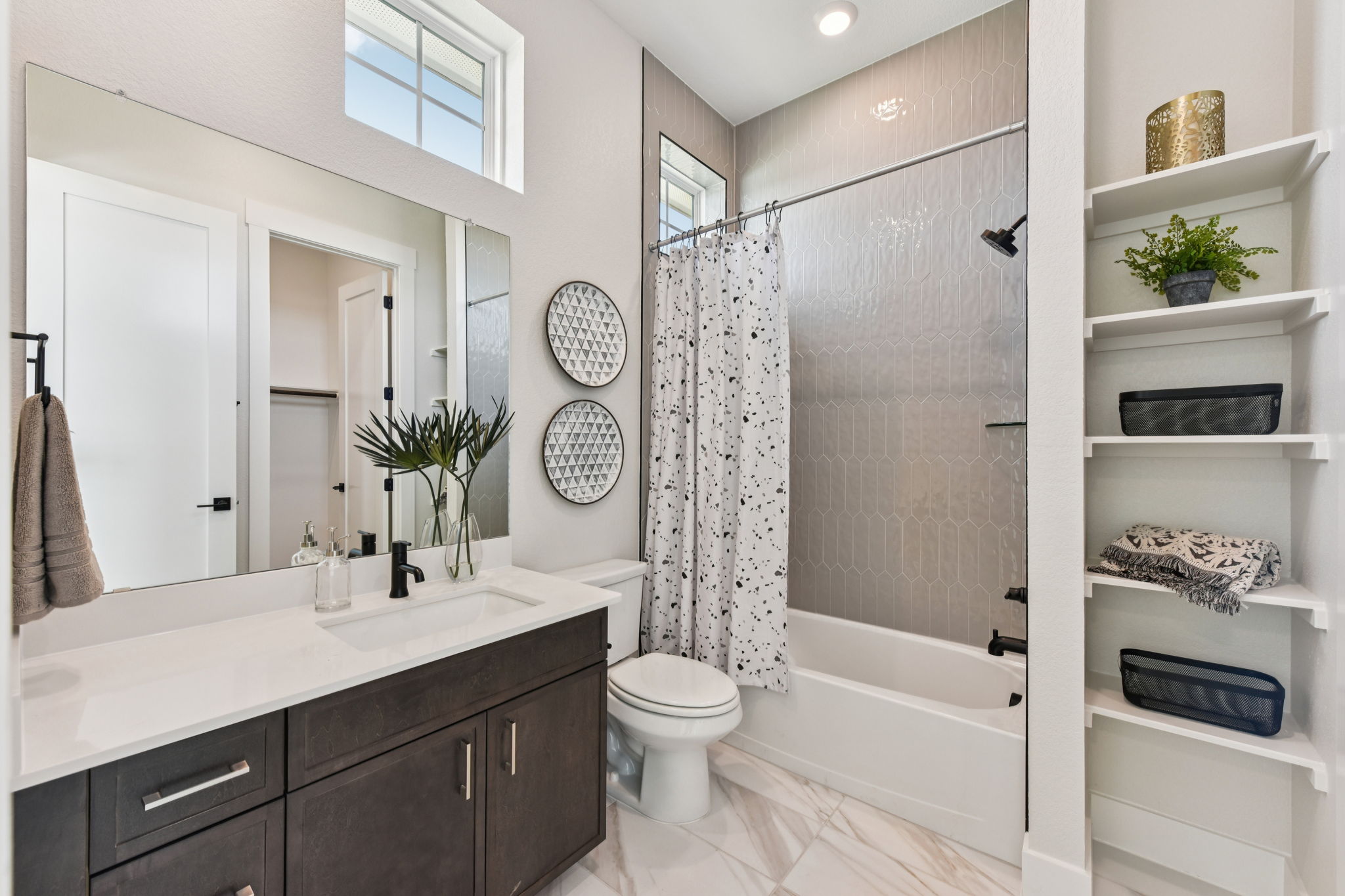 1400 Paxton Lane Georgetown, TX 78633 - Photo 18 of 39 Bathroom with vanity, shower / tub combo with curtain, and a closet