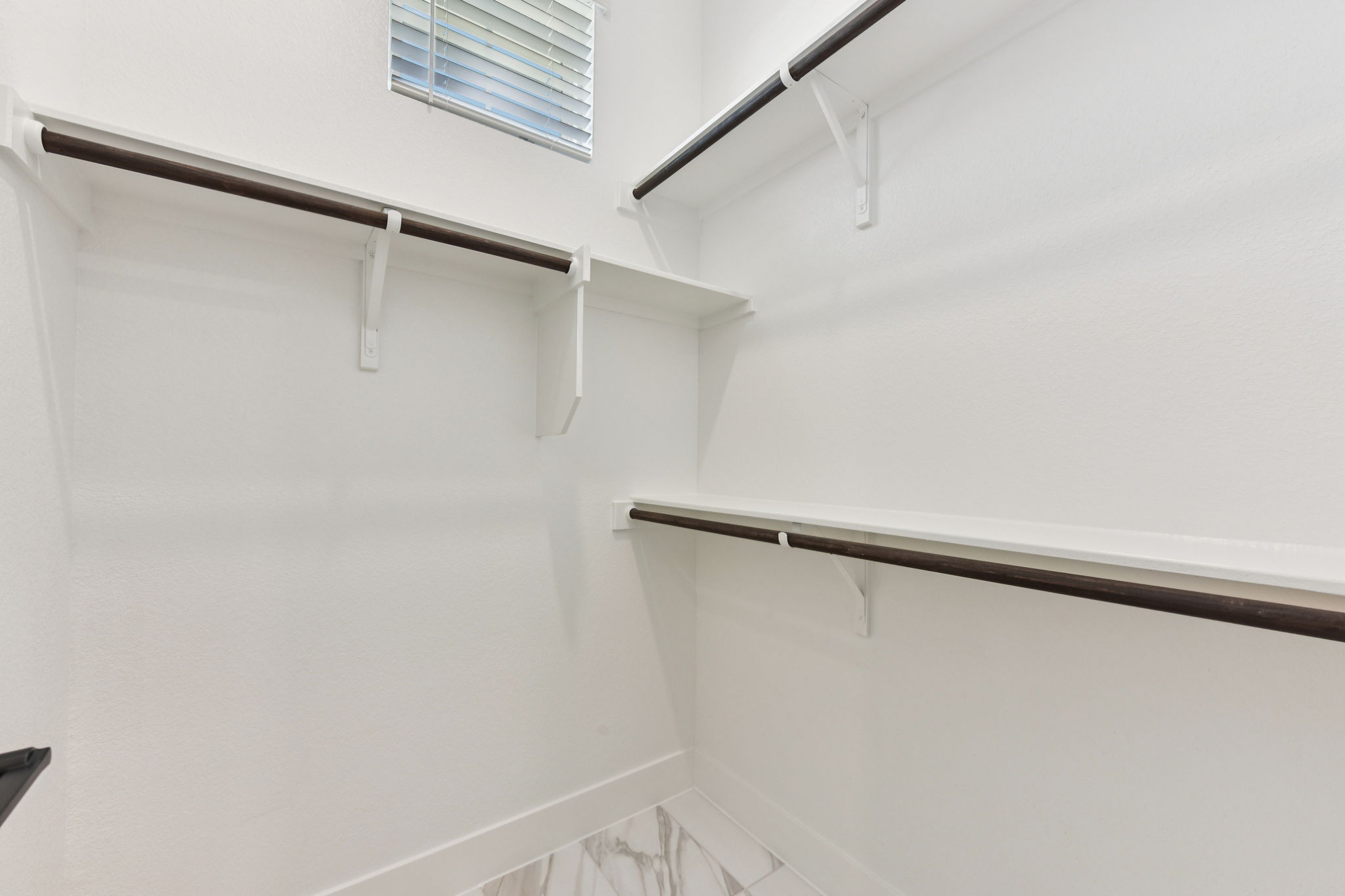 1400 Paxton Lane Georgetown, TX 78633 - Photo 22 of 39 a view of a room with racks on the wall