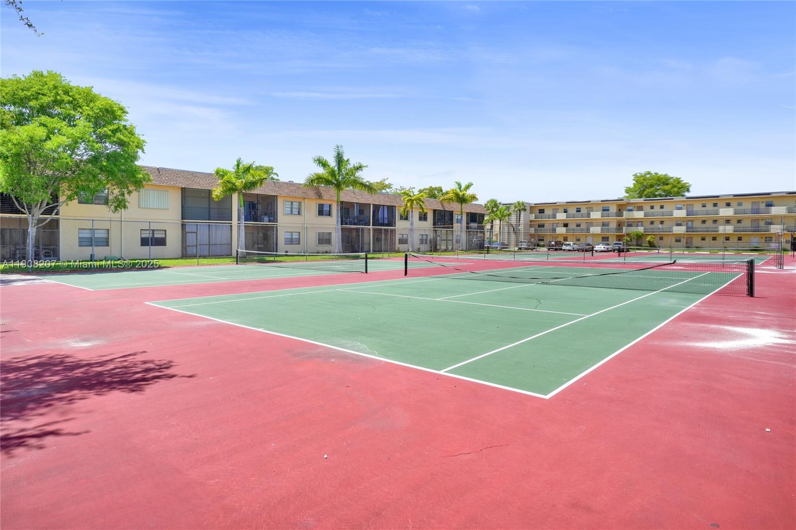 100 Ashbury Road, Unit 103 Hollywood, FL 33024 - Photo 24 of 28 a view of a volley ball court