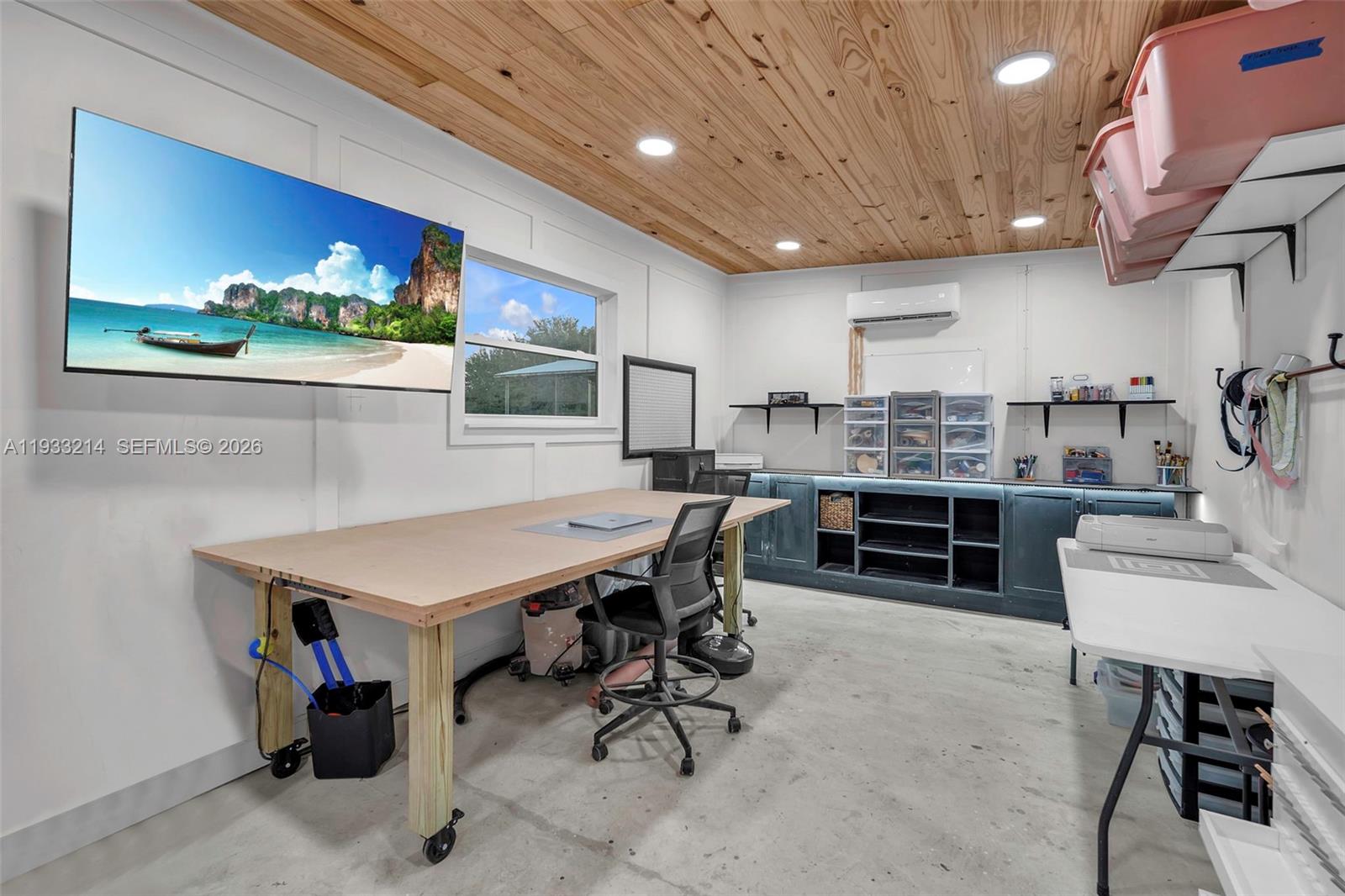 17844 38th Road North Loxahatchee, FL 33470 - Photo 37 of 66 a room with furniture a clock and a view of kitchen