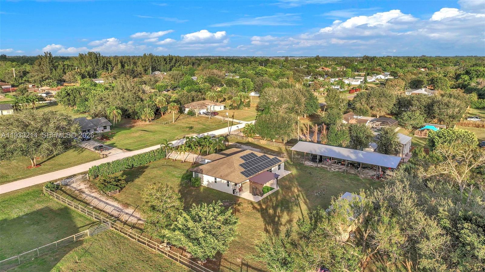 17844 38th Road North Loxahatchee, FL 33470 - Photo 47 of 66 a view of a lake from a yard