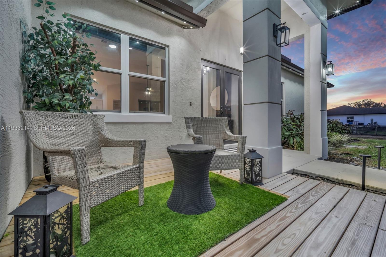 17844 38th Road North Loxahatchee, FL 33470 - Photo 53 of 66 a view of a house with backyard sitting area and garden