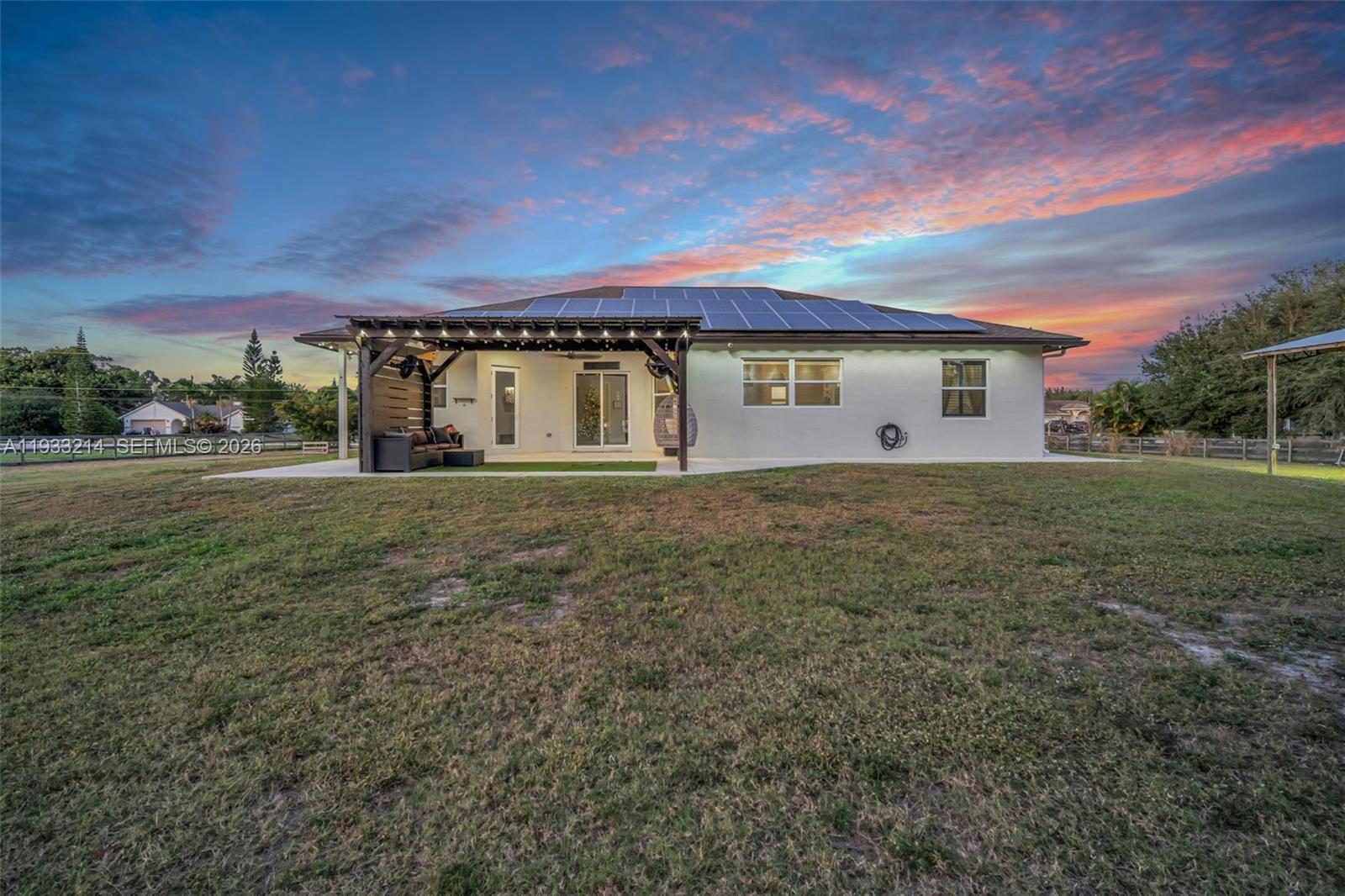 17844 38th Road North Loxahatchee, FL 33470 - Photo 59 of 66 a view of a house with a yard