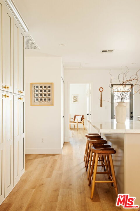 2831 South Corning Street Los Angeles, CA 90034 - Photo 18 of 41 a living room with furniture and a table