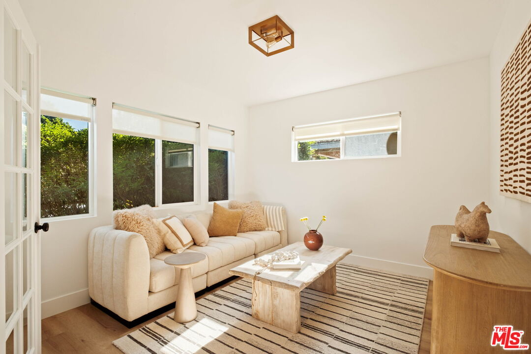 2831 South Corning Street Los Angeles, CA 90034 - Photo 19 of 41 a living room with furniture and a window
