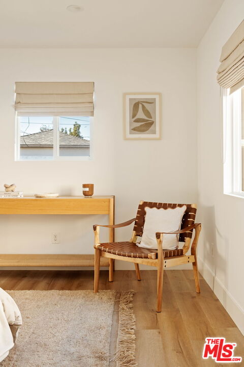2831 South Corning Street Los Angeles, CA 90034 - Photo 22 of 41 a reading room with lounge chair and a table