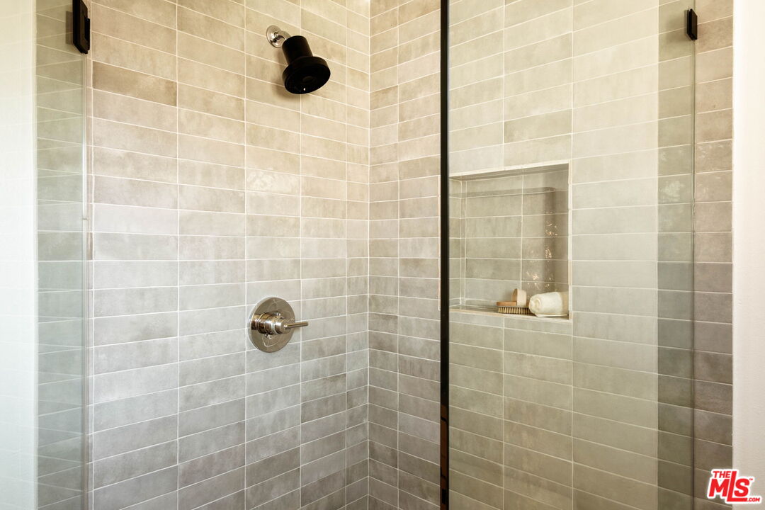 2831 South Corning Street Los Angeles, CA 90034 - Photo 26 of 41 a bathroom with a shower