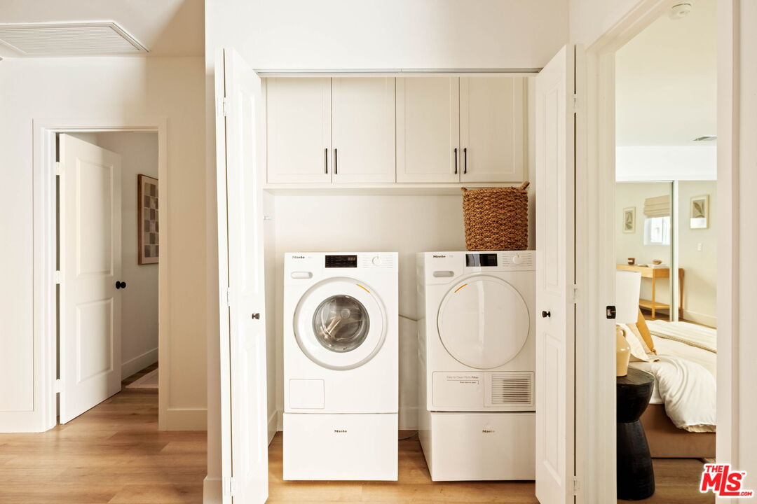 2831 South Corning Street Los Angeles, CA 90034 - Photo 33 of 41 a view of bathroom with washer and dryer
