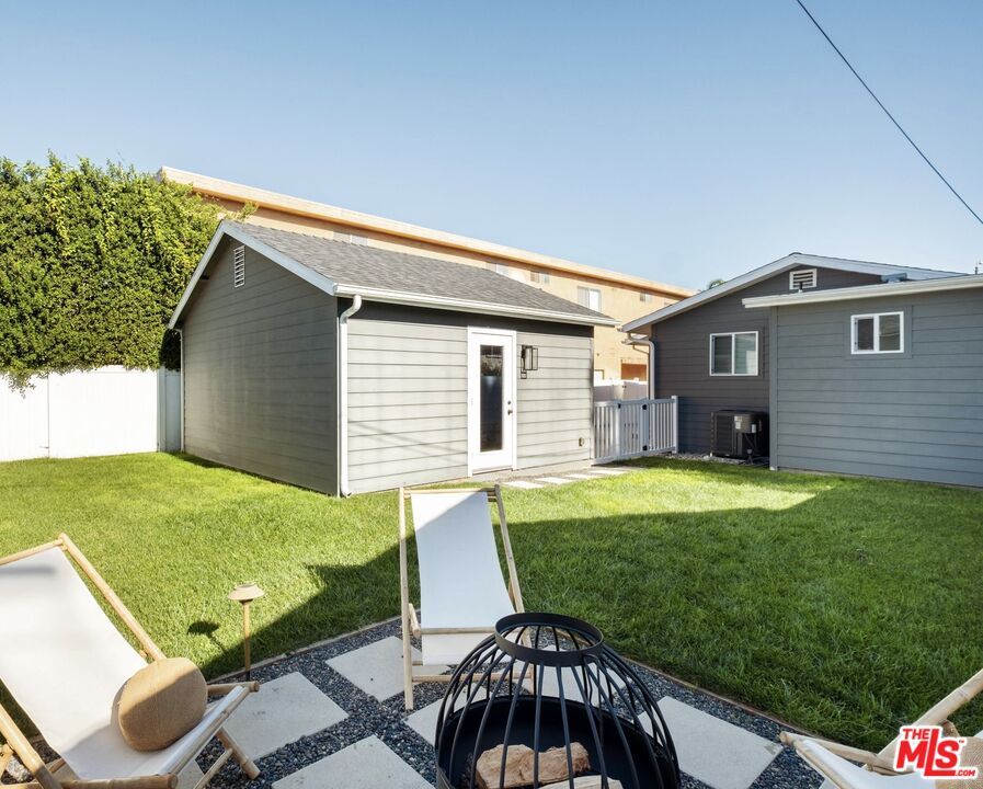 2831 South Corning Street Los Angeles, CA 90034 - Photo 40 of 41 a view of a house with a backyard
