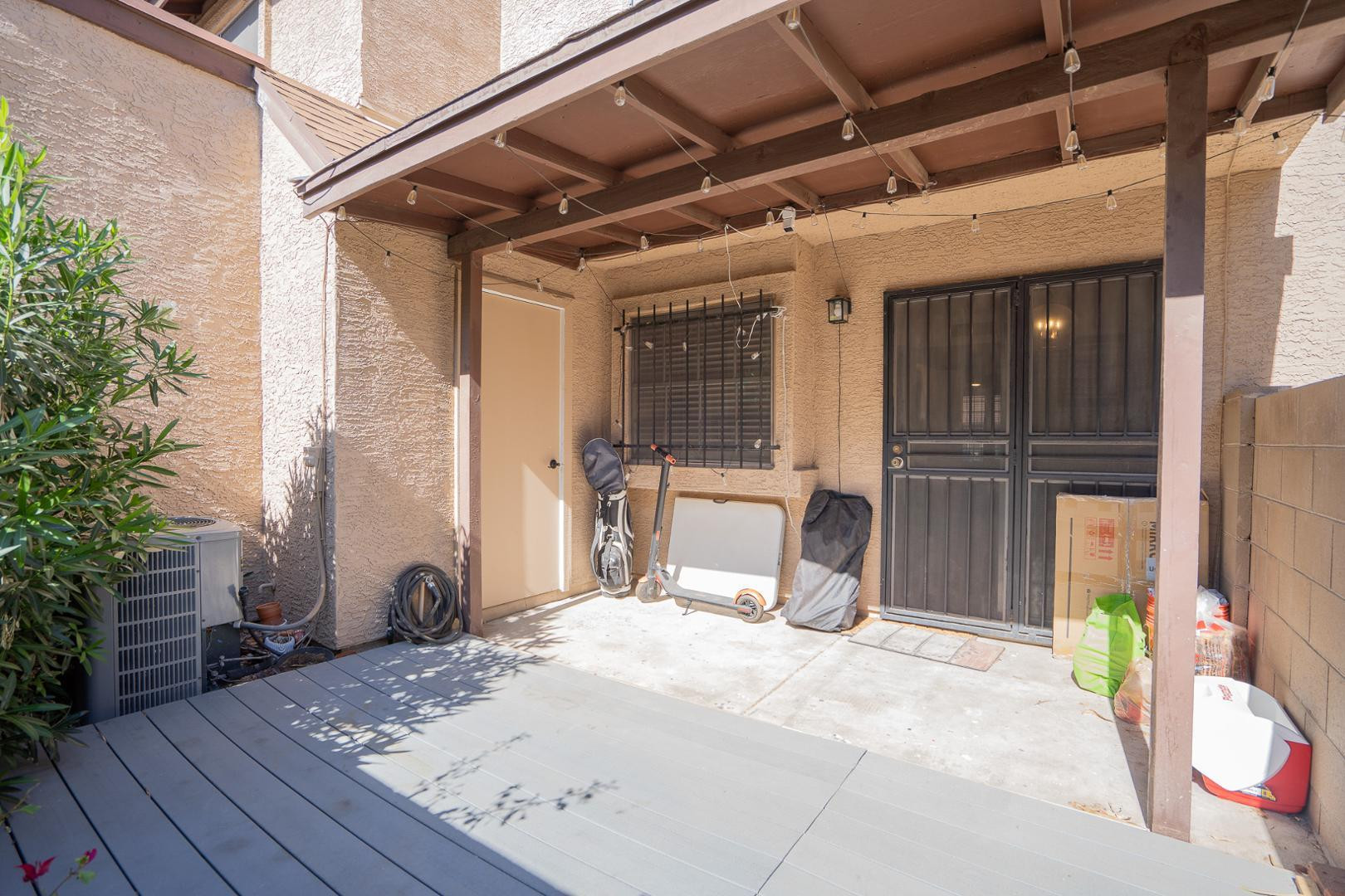 8111 West Wacker Road, Unit 70 Peoria, AZ 85381 - Photo 30 of 38 a view of a backyard of a house