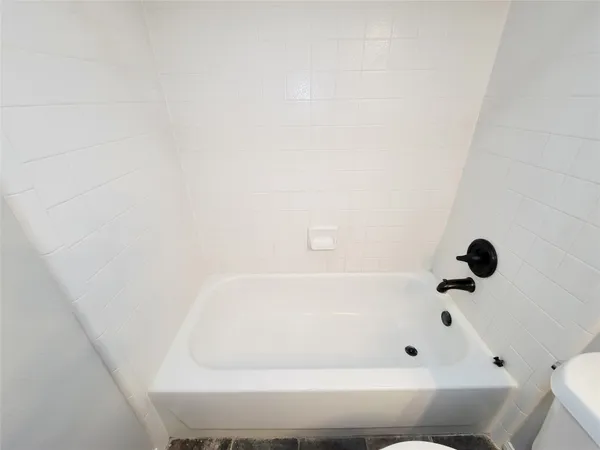 a bathroom with a bathtub