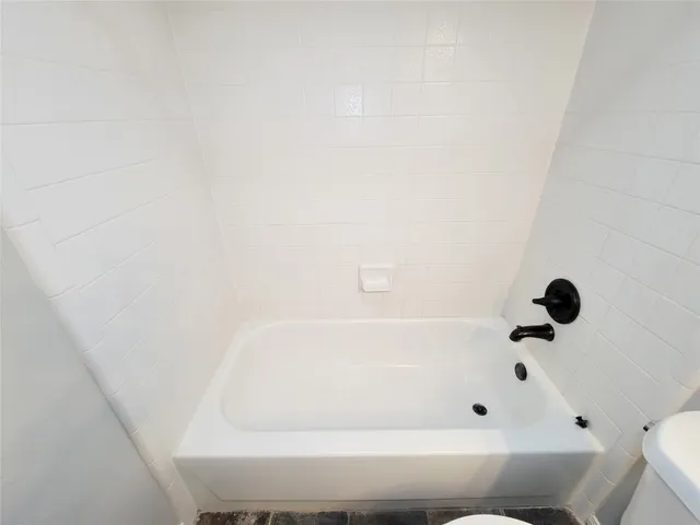 a bathroom with a bathtub