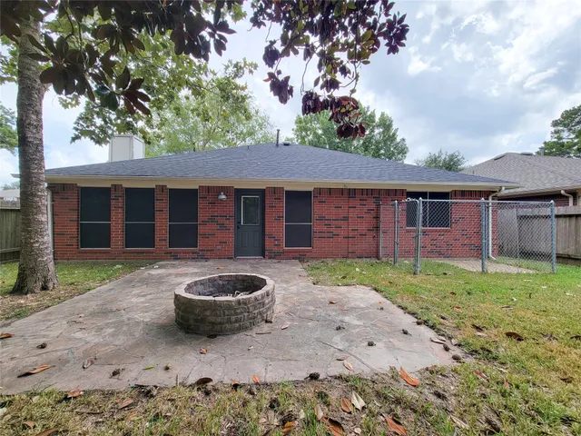 a backyard of a house with seating space