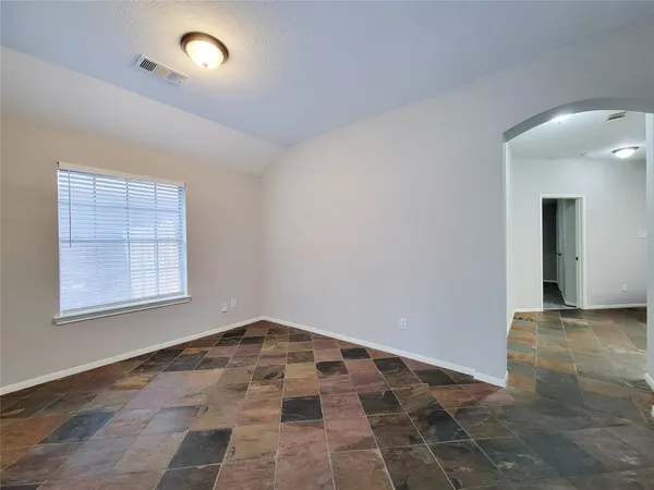an empty room with windows