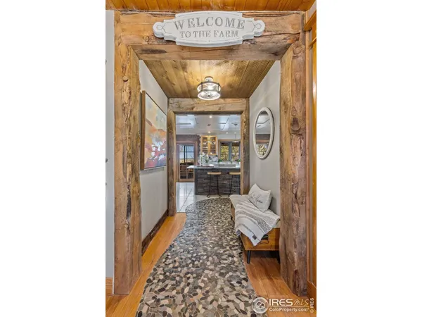 a kitchen with stainless steel appliances granite countertop a sink and a counter top space