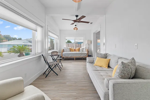 a bedroom with a bed and a cabinet