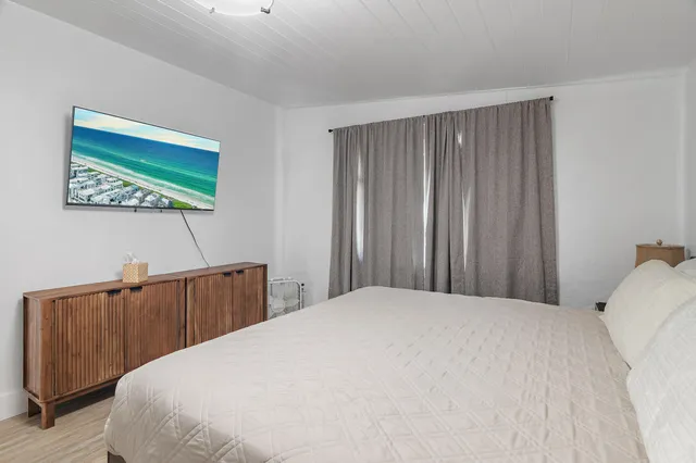 a view of a house with outdoor space and sitting area