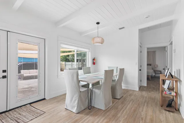 a kitchen with stainless steel appliances a refrigerator sink and microwave