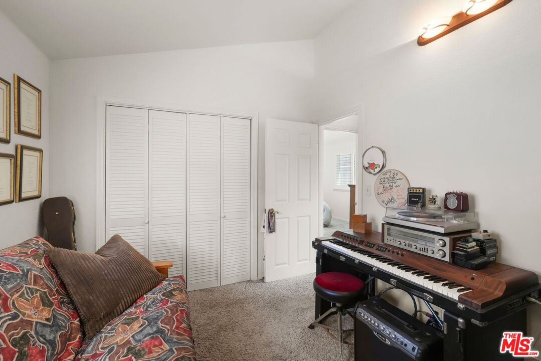 31 Paradise Cove Road Malibu, CA 90265 - Photo 24 of 27 a bedroom with a bed and a window