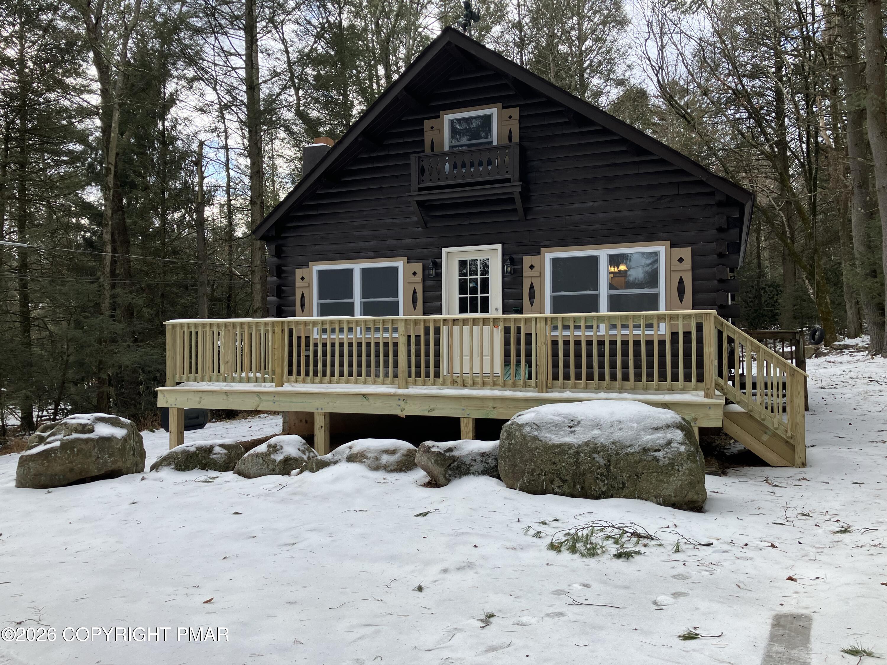 81 Henning Road Albrightsville, PA 18210 - Photo 1 of 9 a front view of a house with a yard