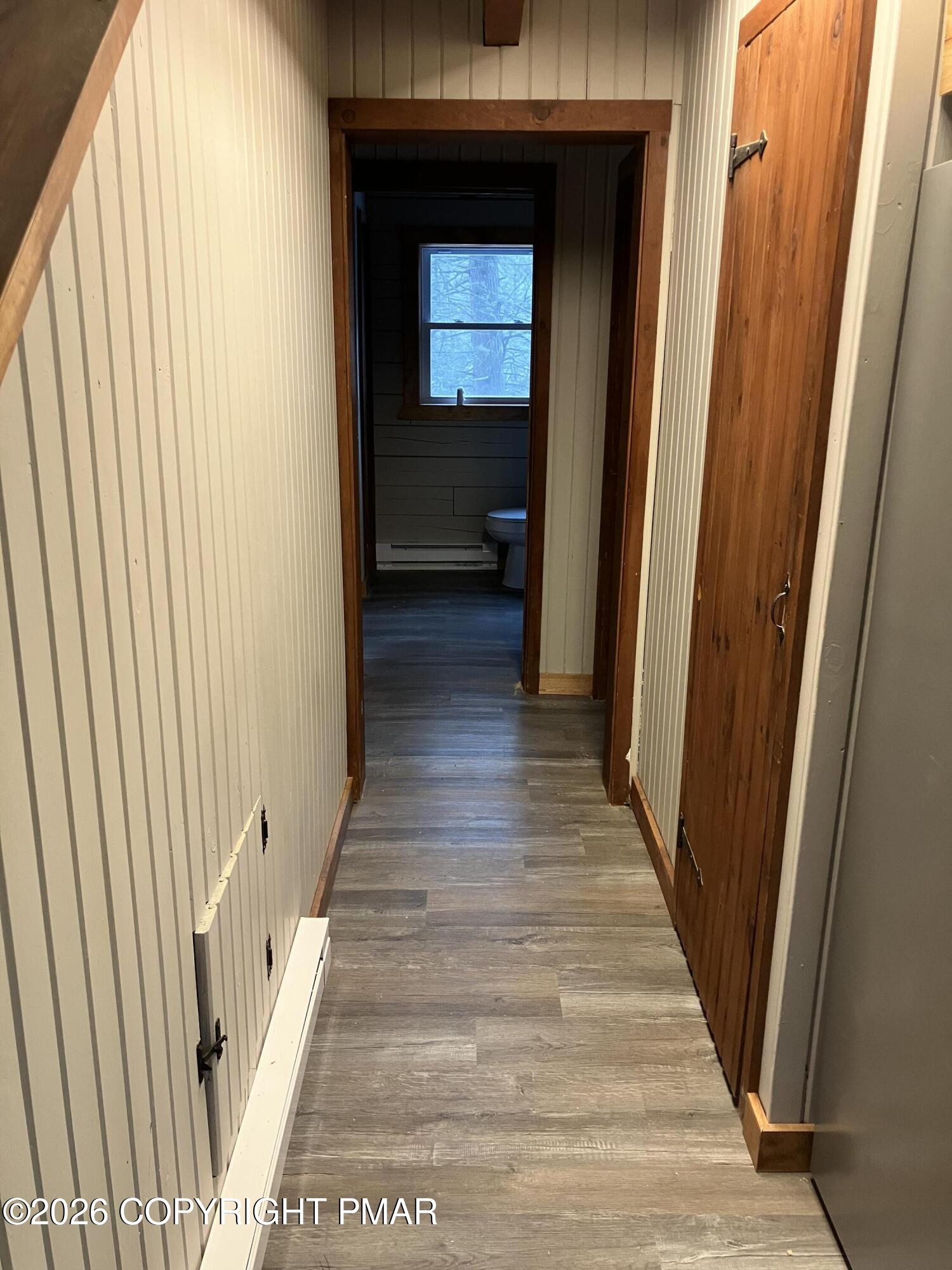 81 Henning Road Albrightsville, PA 18210 - Photo 9 of 9 a view of a hallway with wooden floor and staircase