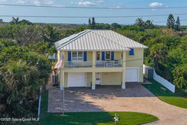 a house view with a garden space