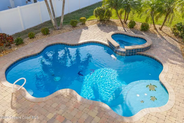 a balcony with furniture and wooden floor