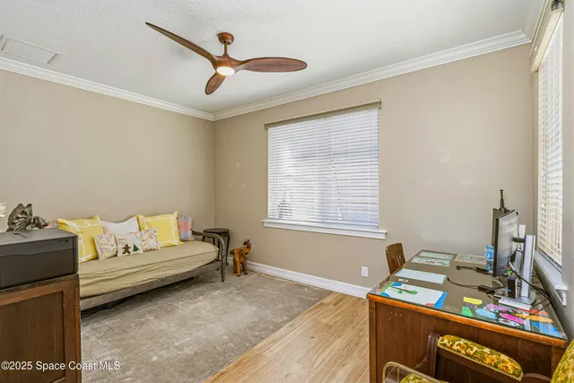 a view of balcony with wooden floor and outdoor seating