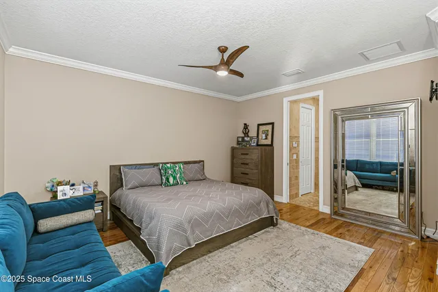 a view of a livingroom with furniture and a window
