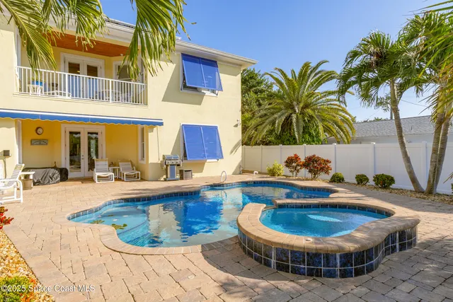 a house view with a garden space