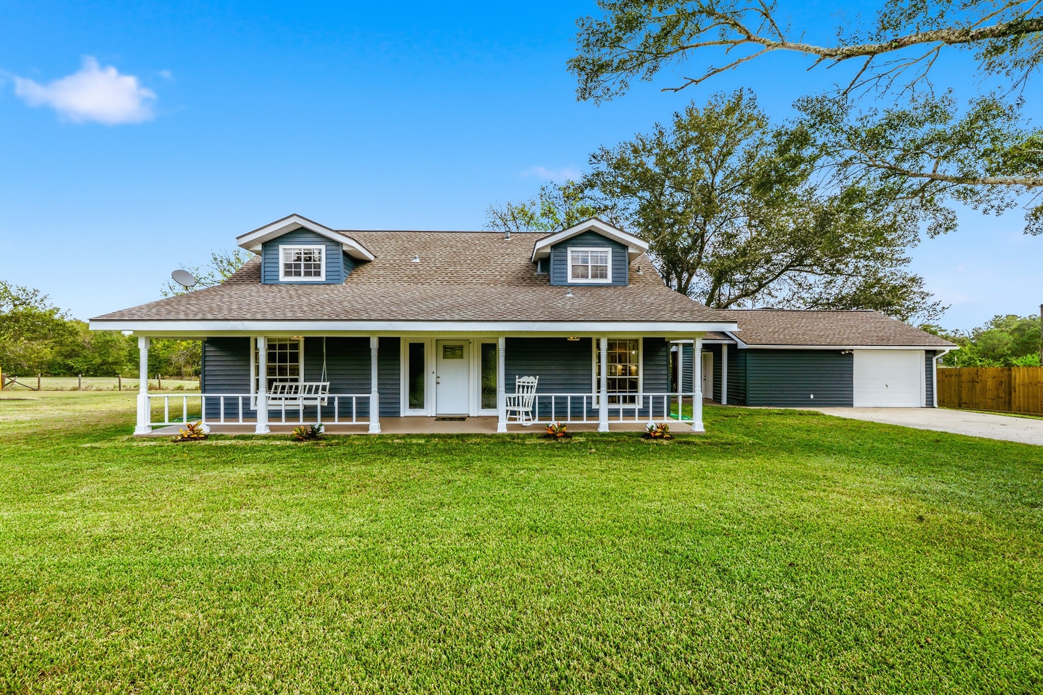 a view of a house with a garden