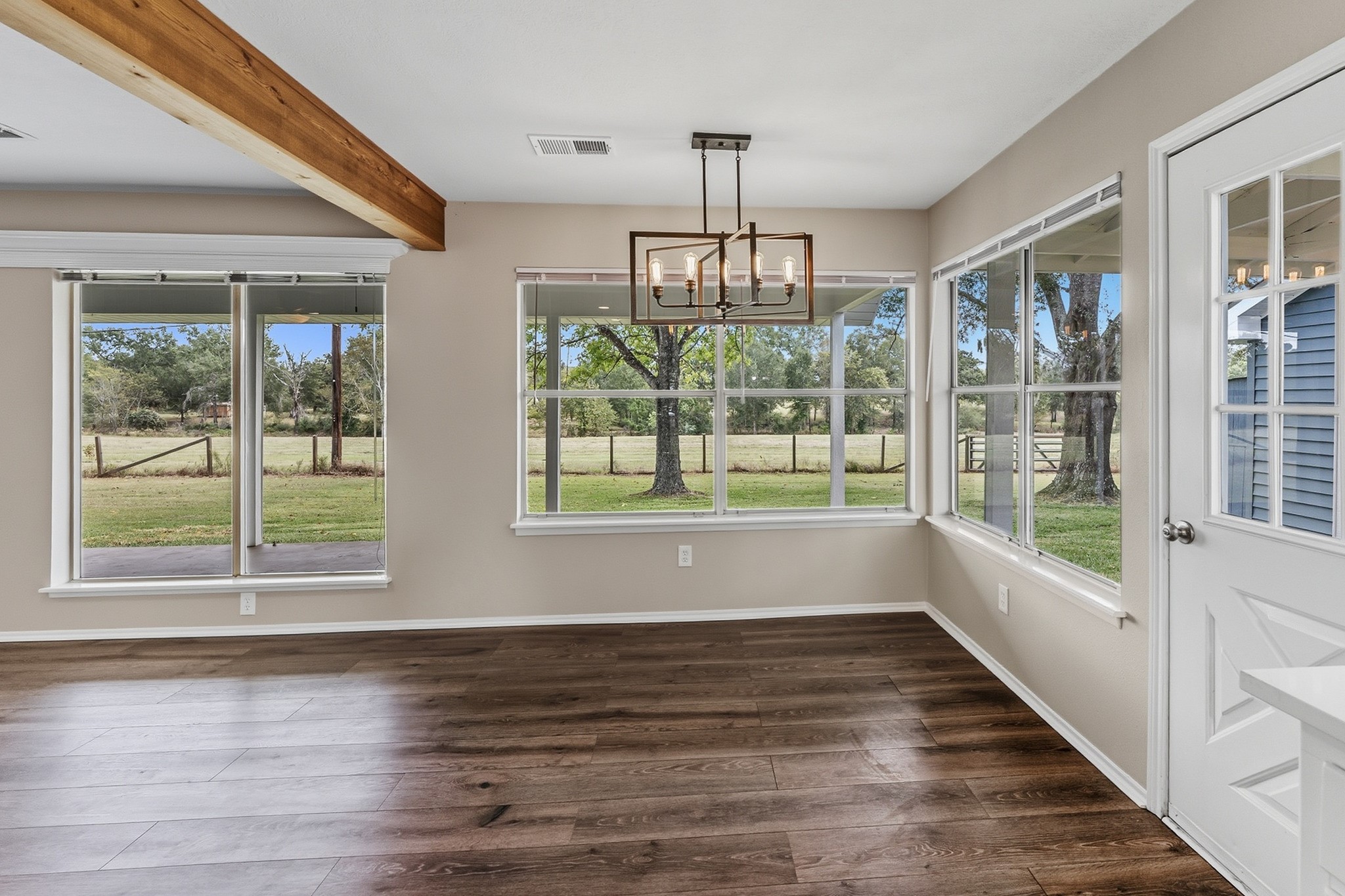 791 Farm To Market 1617 Trinity, TX 75862 - Photo 19 of 50 a view of empty room with wooden floor and fan