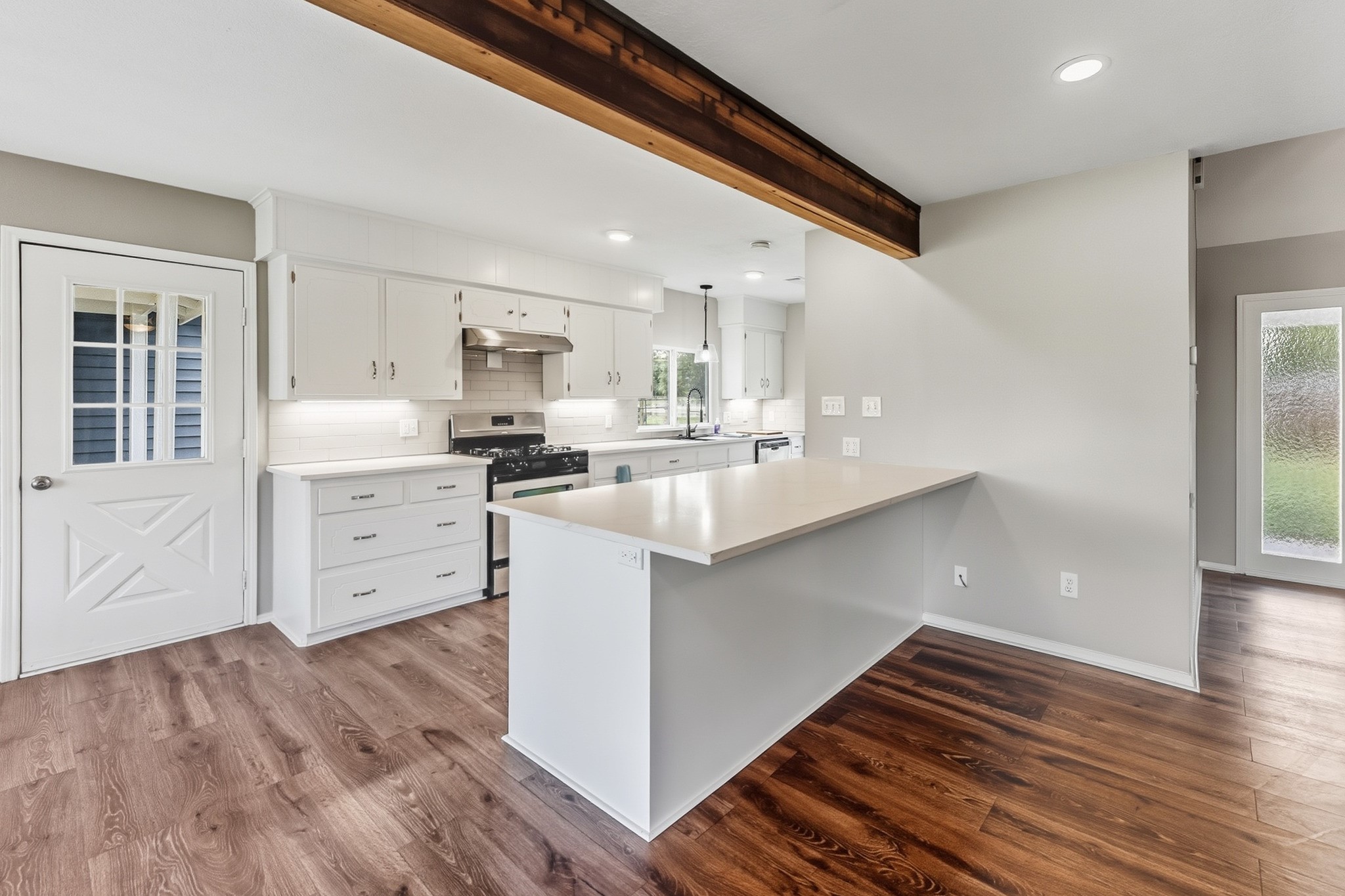 791 Farm To Market 1617 Trinity, TX 75862 - Photo 21 of 50 a kitchen with stainless steel appliances a sink stove and cabinets