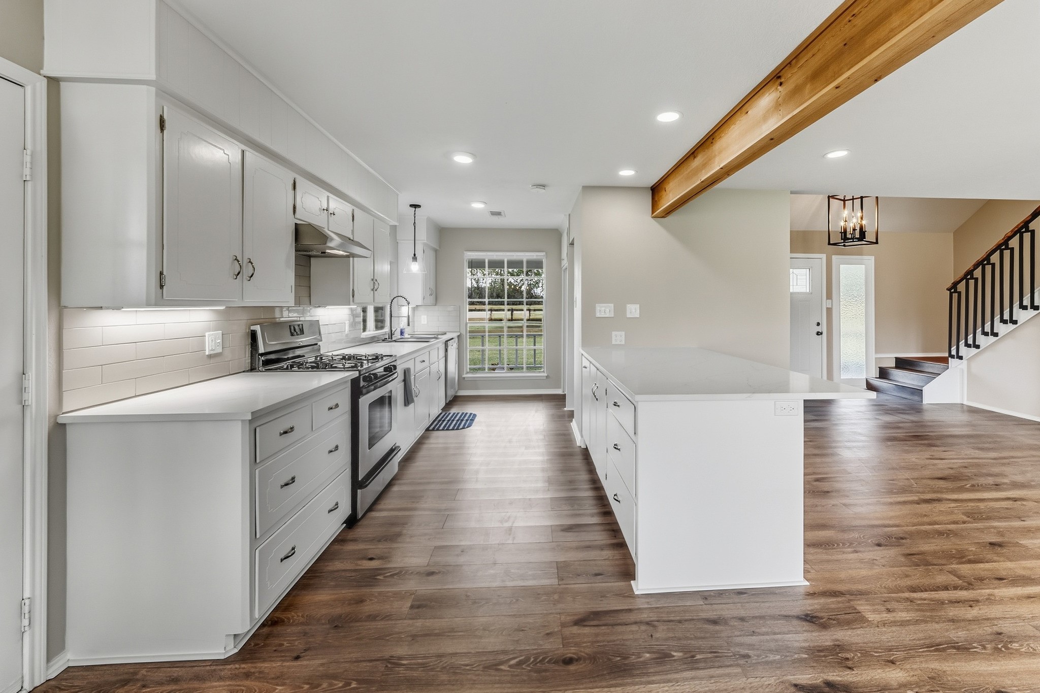 791 Farm To Market 1617 Trinity, TX 75862 - Photo 22 of 50 a large kitchen with stainless steel appliances a large counter top a sink a stove and a refrigerator