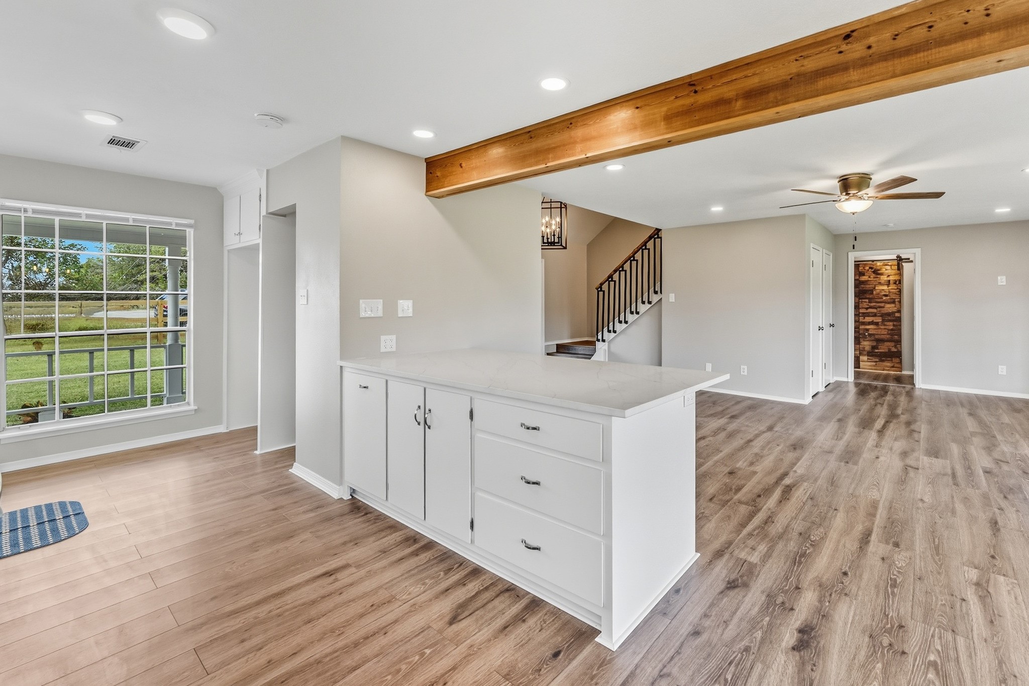 791 Farm To Market 1617 Trinity, TX 75862 - Photo 23 of 50 a view of a hallway with wooden floor and staircase