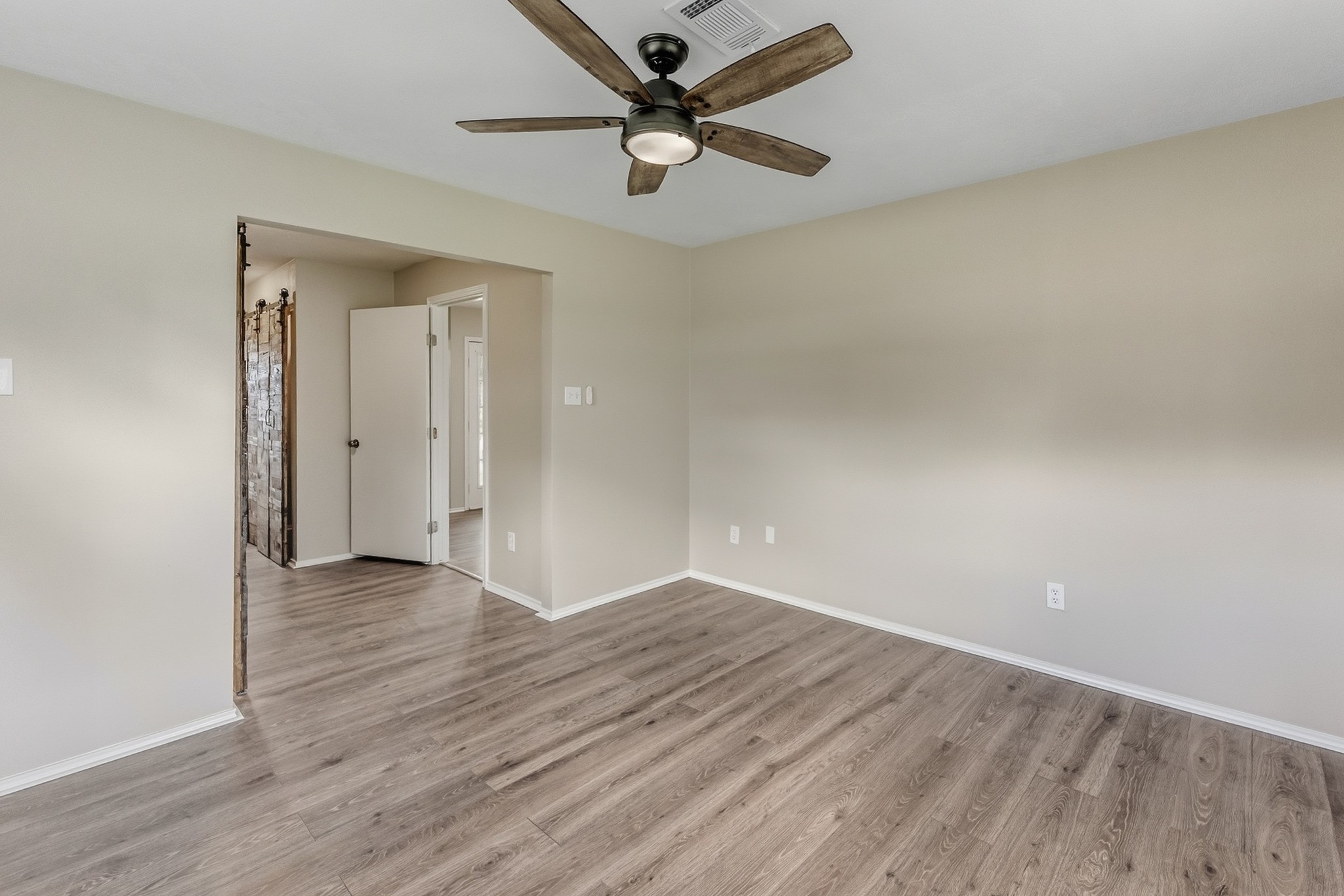 791 Farm To Market 1617 Trinity, TX 75862 - Photo 32 of 50 wooden floor in an empty room