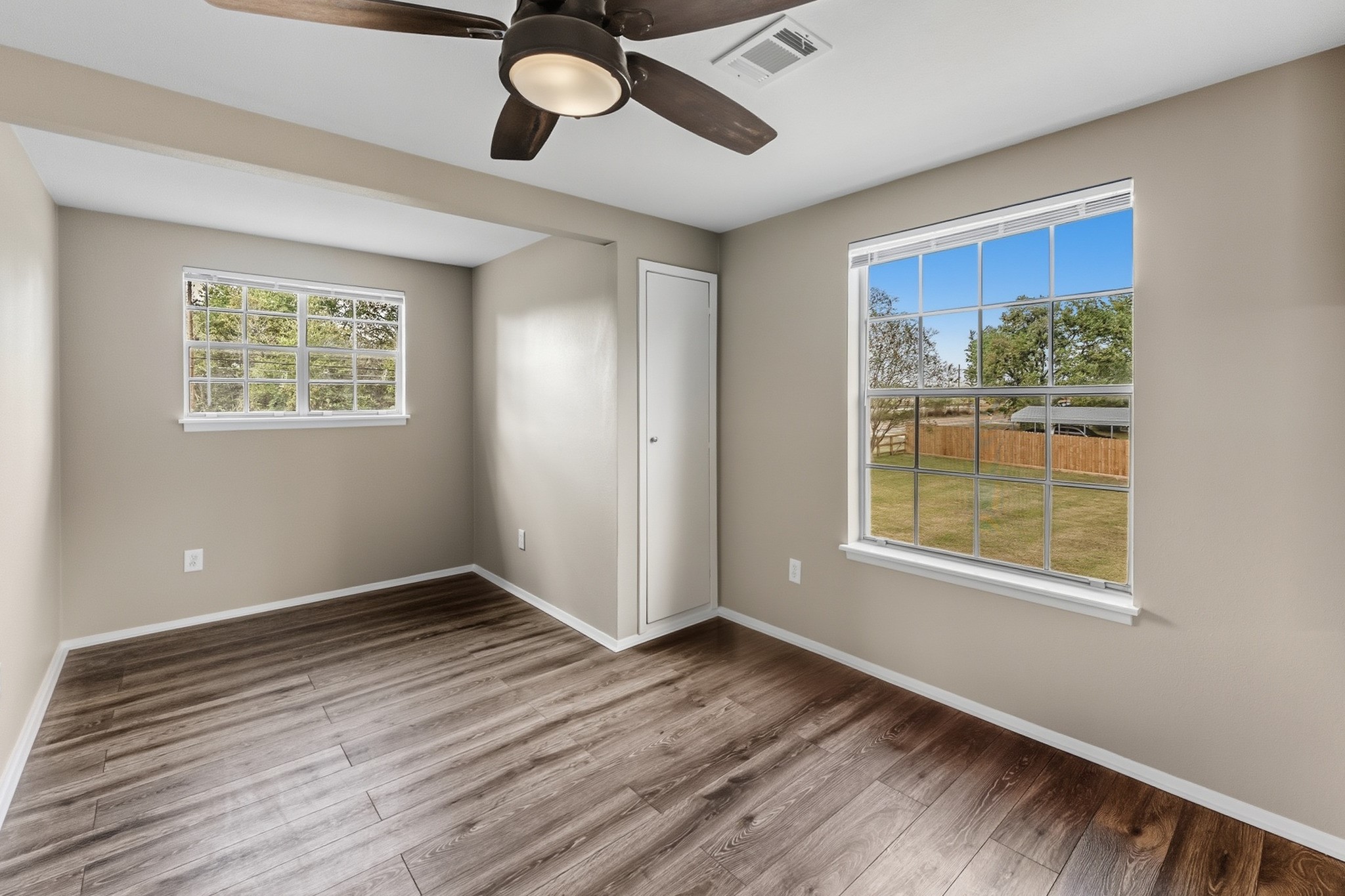 791 Farm To Market 1617 Trinity, TX 75862 - Photo 39 of 50 a view of an empty room with wooden floor and a window