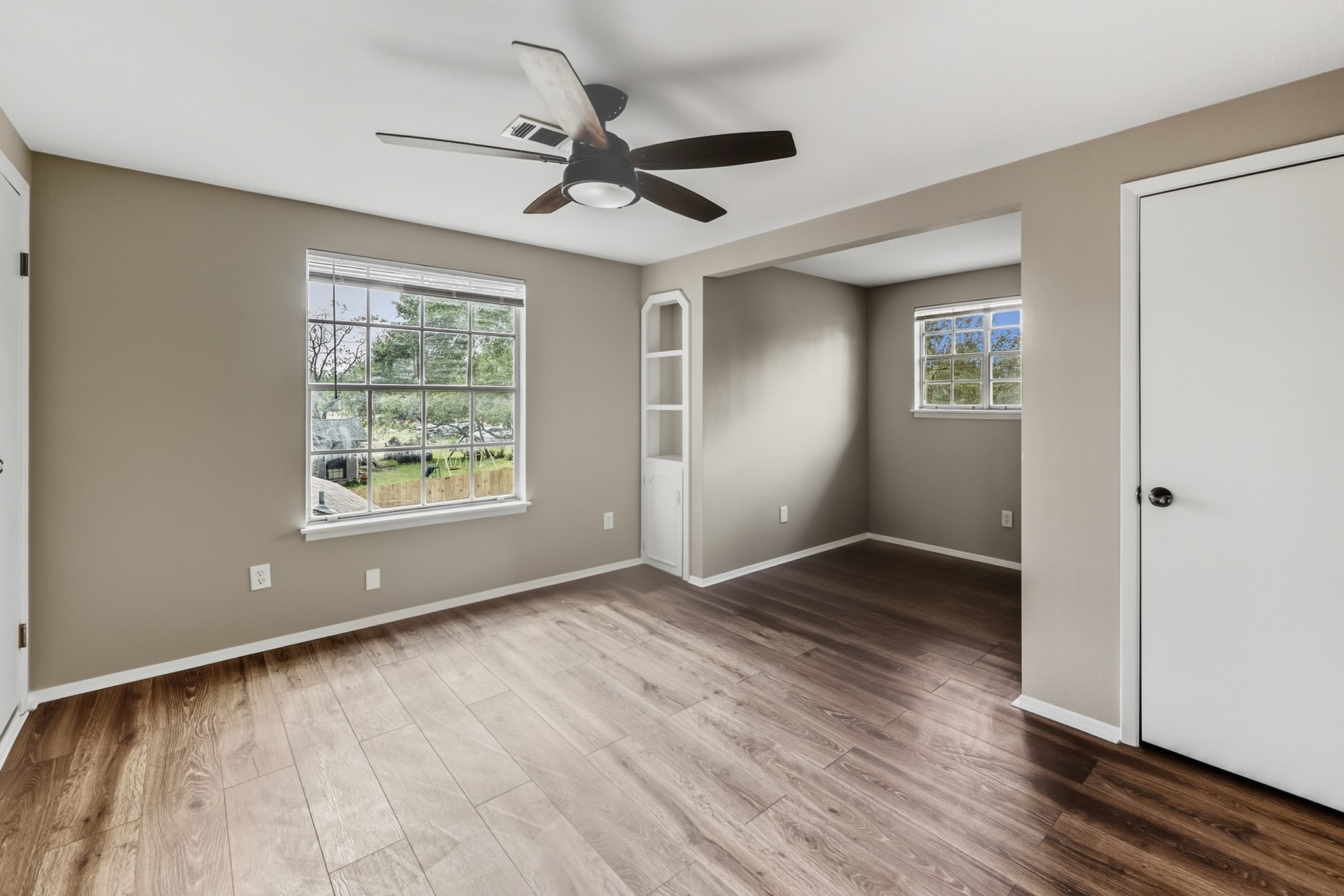 791 Farm To Market 1617 Trinity, TX 75862 - Photo 44 of 50 wooden floor in an empty room with a window