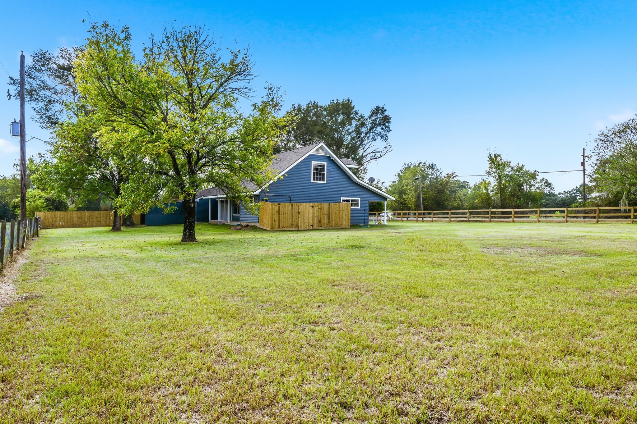 791 Farm To Market 1617 Trinity, TX 75862 - Photo 48 of 50 a front view of a house with a yard