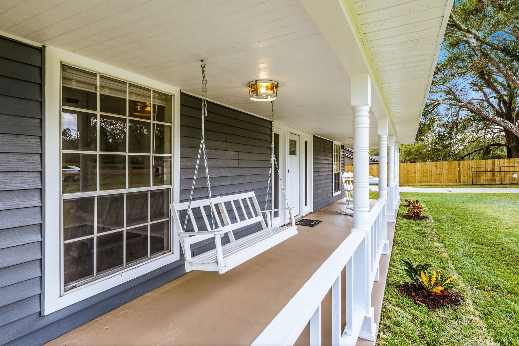 791 Farm To Market 1617 Trinity, TX 75862 - Photo 7 of 50 a view of a chair and table in the back yard of a house