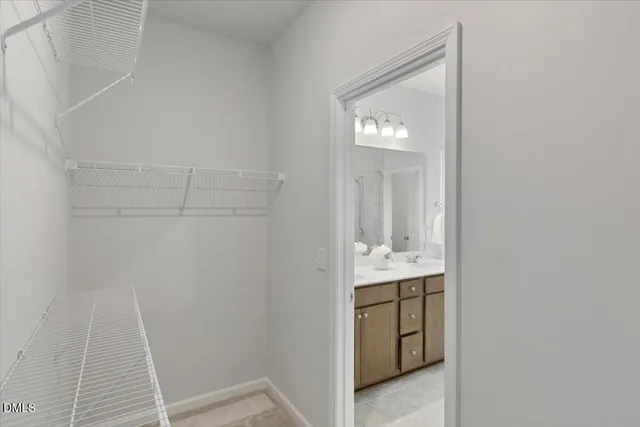 a view of a house with wooden deck