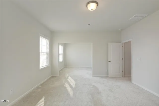 a view of a swimming pool with outdoor seating