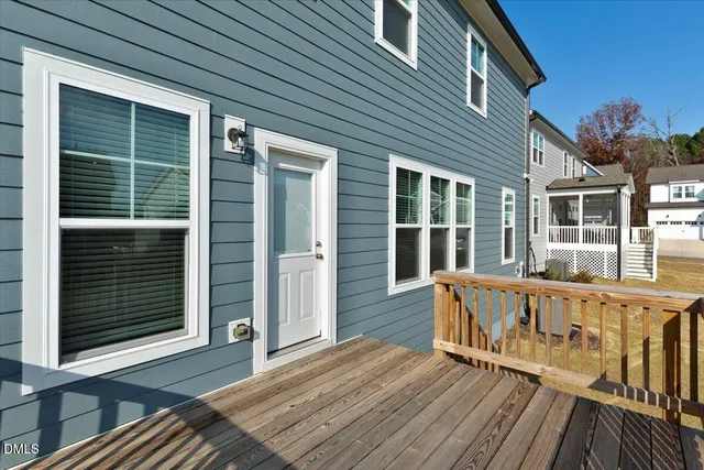 an aerial view of a house with swimming pool