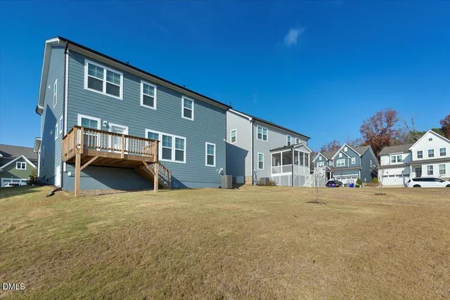 an aerial view of a house with a garden