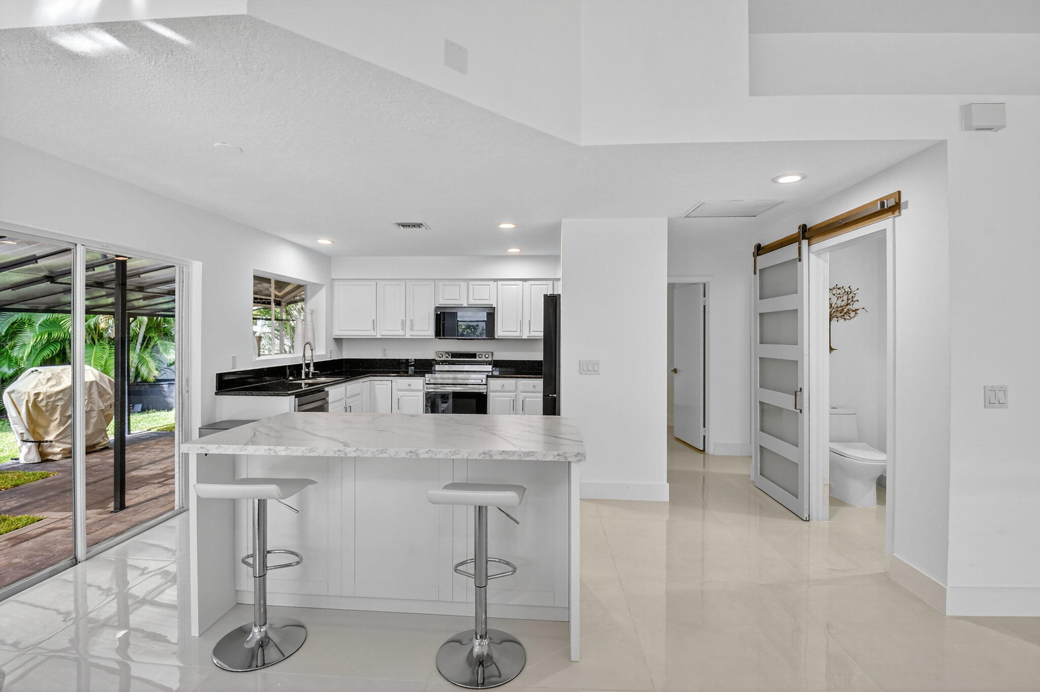 2218 Northwest 52nd Street Boca Raton, FL 33496 - Photo 8 of 39 20250829233611884899000000-o