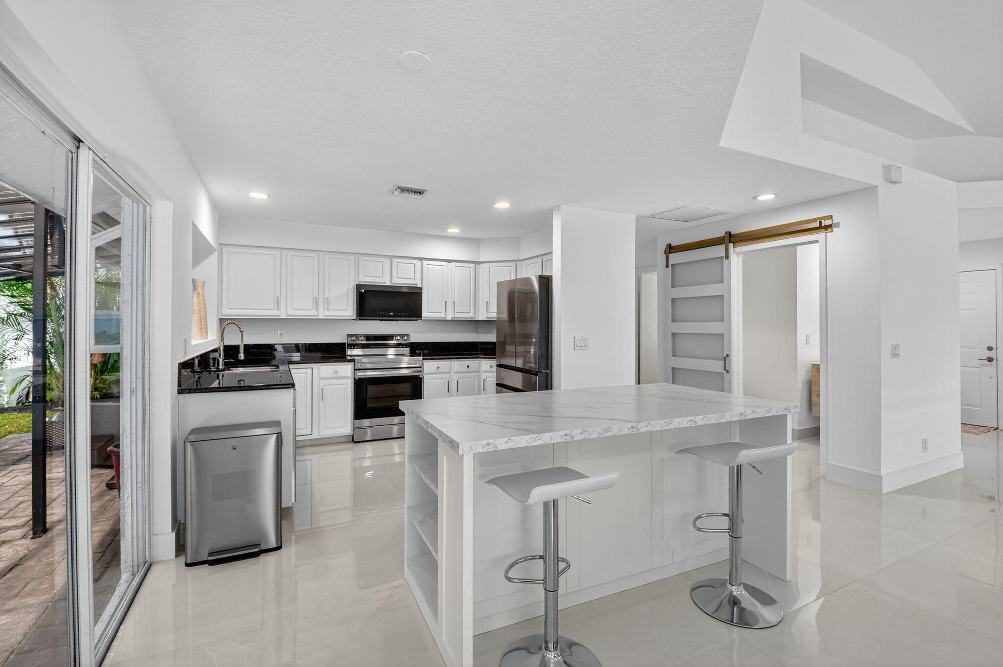 2218 Northwest 52nd Street Boca Raton, FL 33496 - Photo 9 of 39 20250829233612576982000000-o