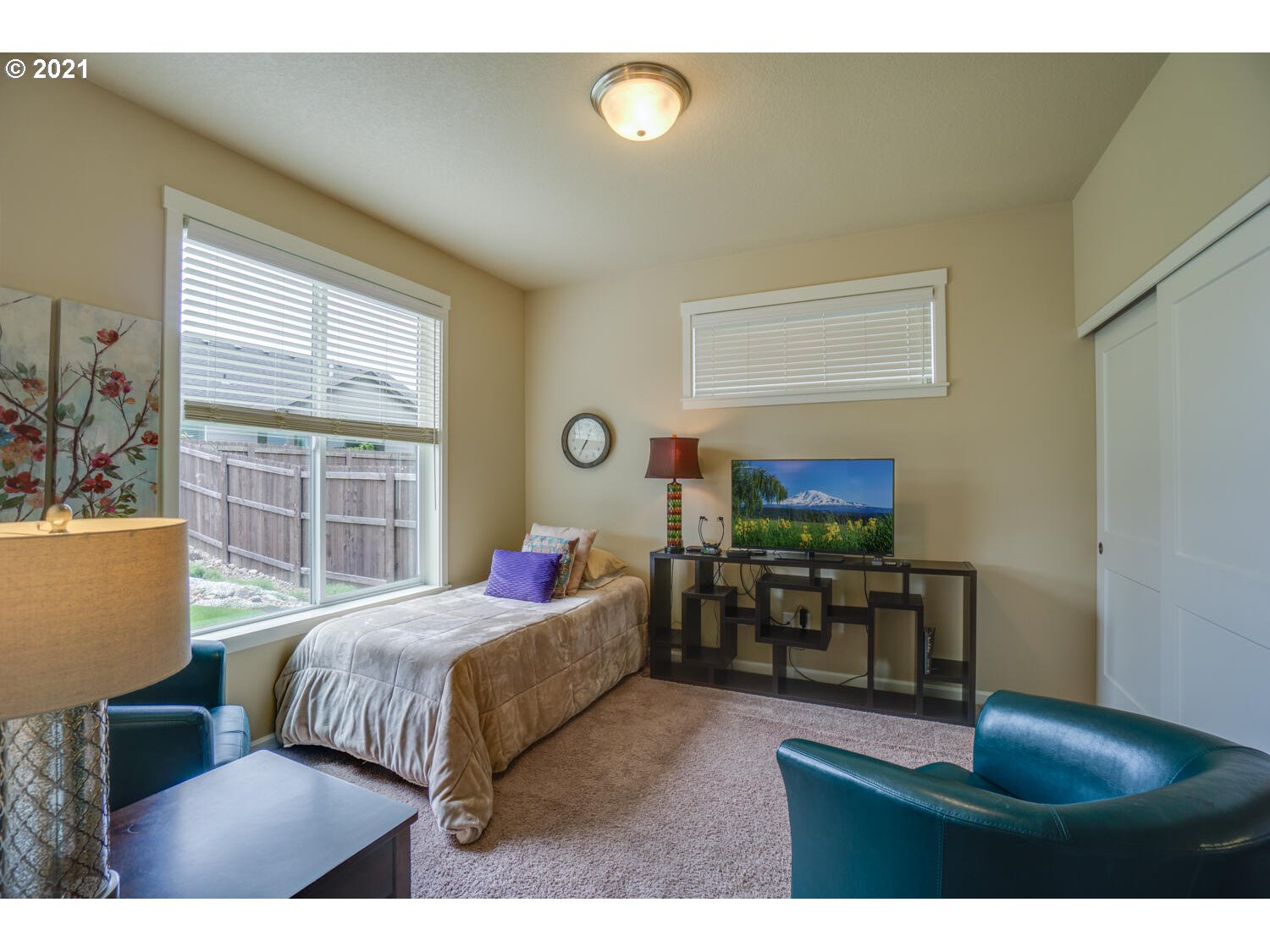 4639 North Noble Loop Ridgefield, WA 98642 - Photo 13 of 32 a bedroom with furniture and a window